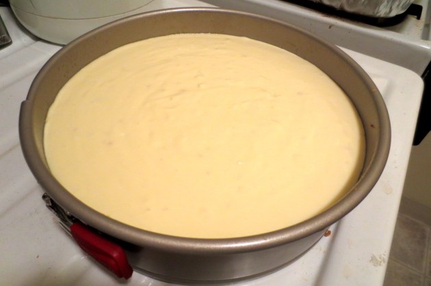 Carefully pour the cheesecake batter onto your crust. I actually spooned it at first to make sure my crust stayed in the pan :)